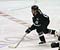 Scott Hannan with the puck