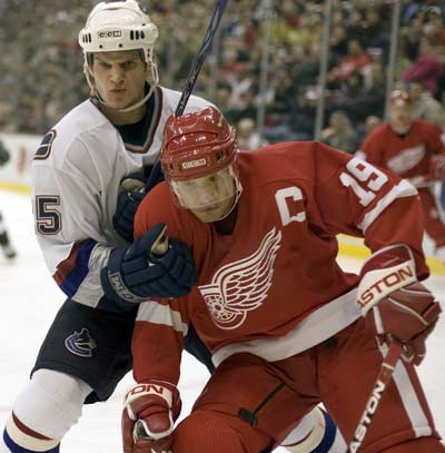 San Jose Sharks' Patrick Rissmiller, left, chases Columbus Blue